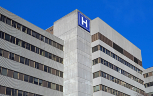 Exterior view of a large concrete hospital building